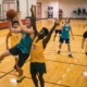 group of people playing basketball